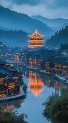 Obraz premium Traditional Chinese ancient town night scene, illuminated wooden houses, golden pavilion, mountain valley, river reflection, starry sky