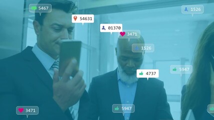 Mid adult man making phone call sparking floating social media metrics around professionals in lift