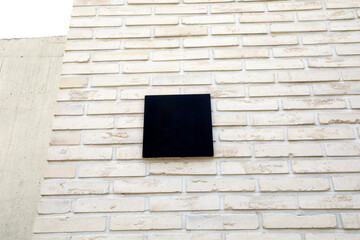 Stylish White Brick Wall with Black Square Design