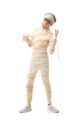 Scary teenage boy dressed as mummy for Halloween on white background