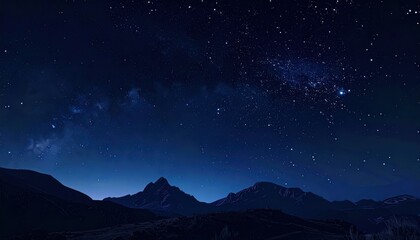 A starry vista showcases majestic mountains silhouetted against a deep blue night sky, speckled with the twinkling lights of the Milky Way galaxy