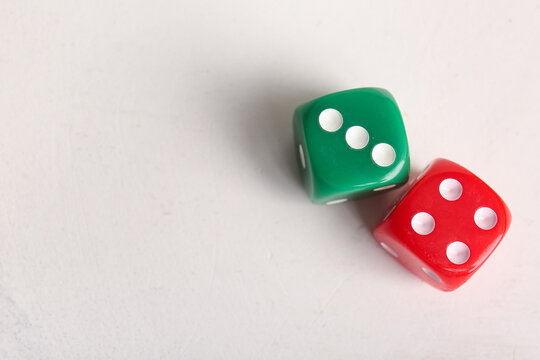 Different dices on light background
