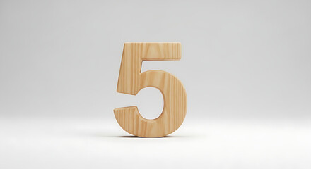 A professional product photograph of a simple, natural wood number '5', perfect for use in education or graphic design.