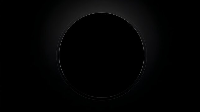 Sleek Black Induction Cooktop Surface with Circle Design and Subtle Lighting