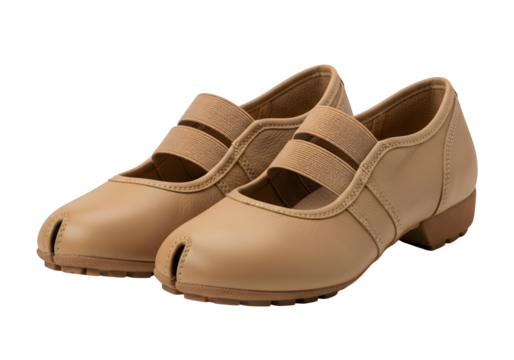 A pair of tan leather character shoes with an elastic strap isolated on transparent background, perfect for dance class or stage performance