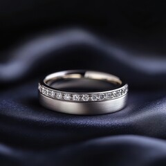 wedding band with diamond inlay on a satin podium, dark blur background