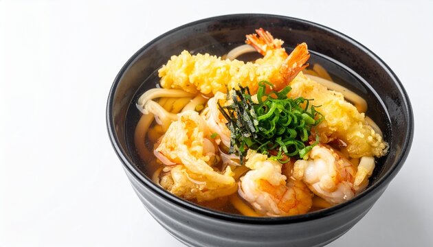 Hot udon noodles with shrimp tempura, seafood, green onions, and seaweed, served in rich japanese broth.