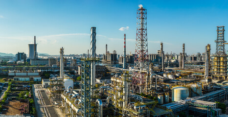 A large oil refinery and petrochemical plant with complex industrial equipment in industrial zone