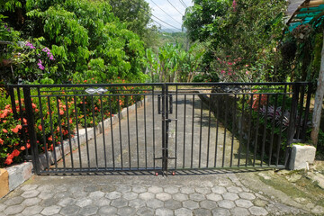 Closed iron gate for house fence. Black house fence. For graphic design, 3D rendering and banners
