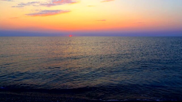 Beautiful summer sunrise over the beach