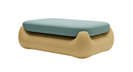 Modern ottoman with a light blue cushion and tan base on a black studio background