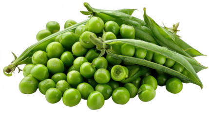 A close up view of fresh green peas and pea pods piled together on a black background in a studio shot