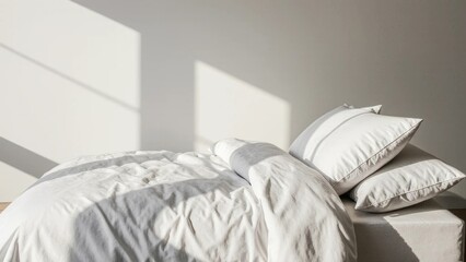 white bed with pillows