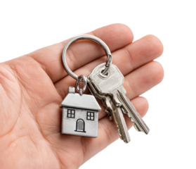 Hand holding house keychain home ownership concept isolated on transparent background