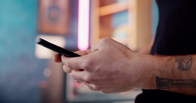 Hands, typing and man with smartphone, internet and social media with tattoos, network and texting. Mobile user, artist and person with cellphone, connection and online chatting with digital app - Powered by Adobe