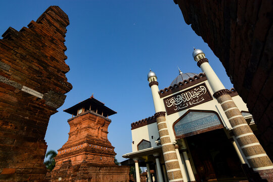 Framing of Menara Kudus Mosque in the Morning with Clear Blue Sky