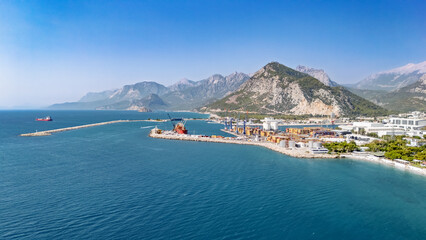 Aerial drone view of Antalya cityscape, Konyaalti beach and cargo port harbor, Antalya holiday vacation resort in Turkey
