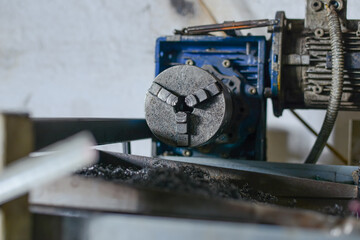 Clamping Reel Lathe Part In Metal Parts Factory. High quality photo