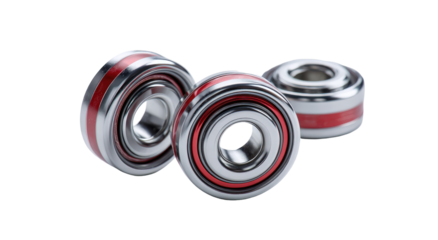 Three metallic bearings with red bands