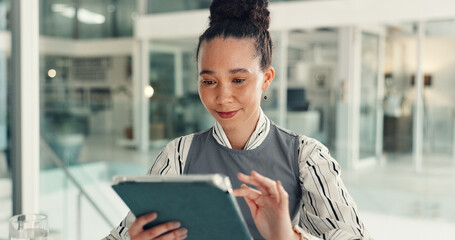 Business, woman and reading on tablet in office for email, article newsletter and editor feedback....