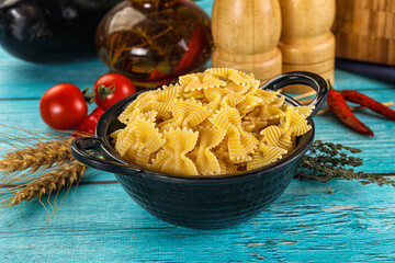 Raw dry farfalle for cooking