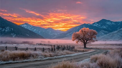 Sunrise paints a frosted mountain valley