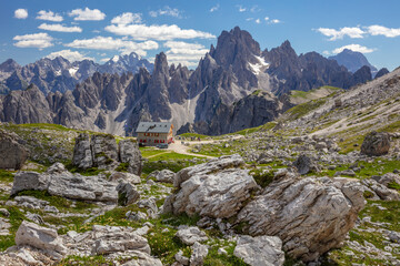 Dolomites and a Tourist Refuge in a Rocky Valley