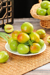Fresh Green Xinjiang Apricots with Natural Skin on Bamboo Placemat - Organic Chinese Fruit Display