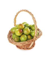 Fresh Green Pears and Apricots in Wicker Basket - Organic Fruit Collection from Xinjiang Market