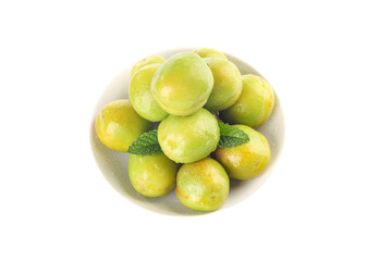 Fresh Green and Yellow Plums with Mint in White Bowl - Healthy Organic Fruit
