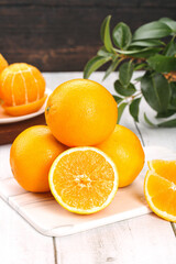 Fresh Navel Oranges on Cutting Board - Healthy Citrus Fruit Kitchen Display