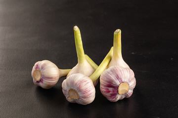 Raw young garlic bulb heap