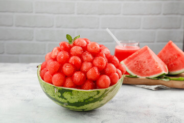Fresh Watermelon Balls in Natural Bowl with Mint Garnish and Juice - Summer Fruit Display