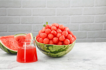 Fresh Watermelon Balls in Natural Melon Bowl with Juice Glass Summer Fruit Display