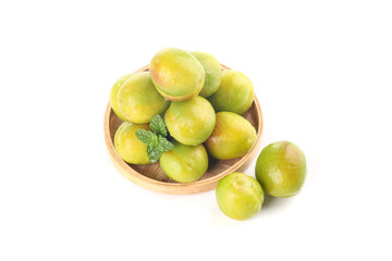 Fresh Green Pears and Apricots from Xinjiang in Wooden Bowl with Mint Leaves