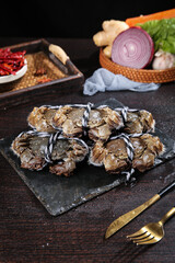 Yangcheng Lake Hairy Crabs on Slate Board with Cooking Ingredients