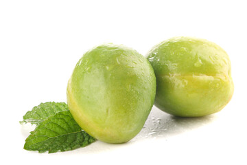 Fresh Green Pears with Water Droplets and Mint Leaves on White Background