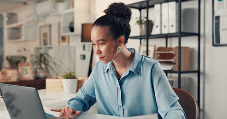 Business woman, reading or research with laptop in office, info or data analysis for marketing...