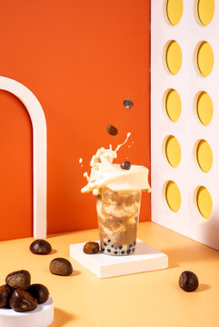 Chestnut pearl milk tea with espresso creative colorful background