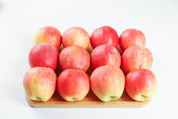 Fresh Red Fuji Apples from Xinjiang China on Wooden Board - Organic Fruit Produce