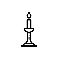 Fototapeta premium A simple candle illuminates the darkness, creating a serene and peaceful ambiance in any setting. Ideal for relaxation and meditation.