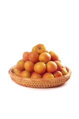 Fresh Xinjiang Apricots in Wicker Basket on White Background
