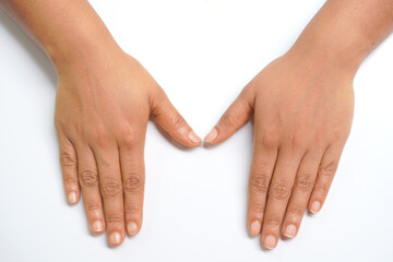 hands of the girl on white background