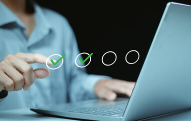 Businessman checking mark and takes online assessment survey test for approve quality assurance and ERP management, Quality management with assurance.