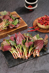 Fresh Red Lettuce Leaves and Seasonal Vegetables with Dried Chilies Traditional Asian Cooking Ingredients Hubei China
