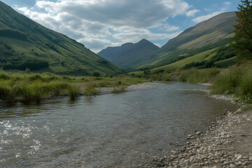 Valley Vista: Capture the serenity of nature with this stunning photograph of a serene river snaking through a majestic valley, showcasing the untamed beauty of the outdoors.