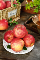 Fresh Seasonal Red Apples with Honey Glaze on Rustic Wooden Table - Yunnan Origin Fruit Display