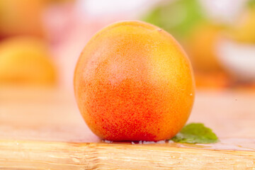 Fresh Ripe Apricot Fruit with Natural Orange Red Coloring on Wooden Background