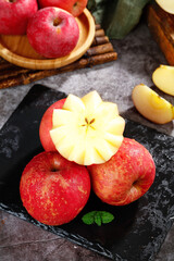 Fresh Red Apples with Star Cut Slice on Slate Board - Healthy Fruit Display