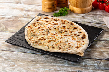 Turkish Kutab staffed green herbs